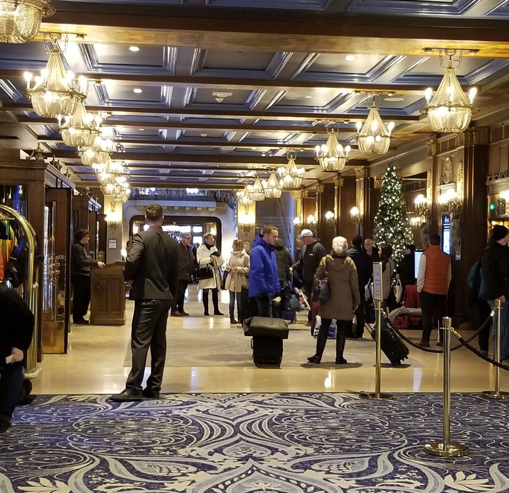 People in the hallway of a hotel