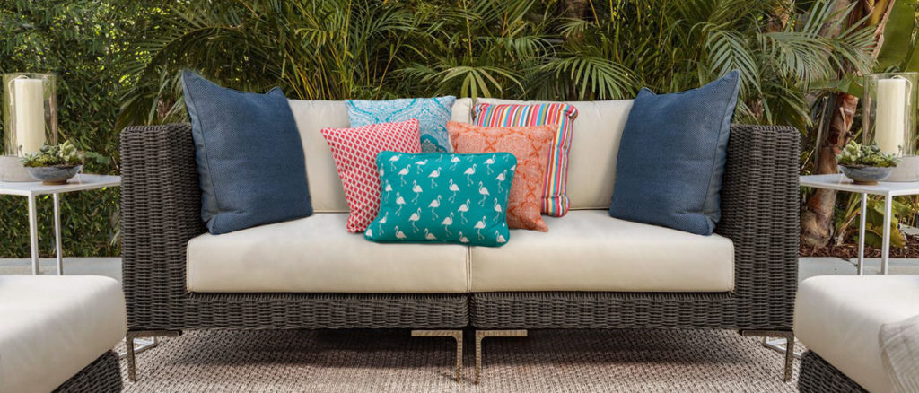 Outdoor Wicker Couch with Colorful Pillows